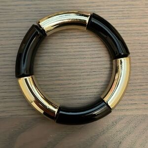 NEW gold and black stretch bangle type bracelet. Good stretch.